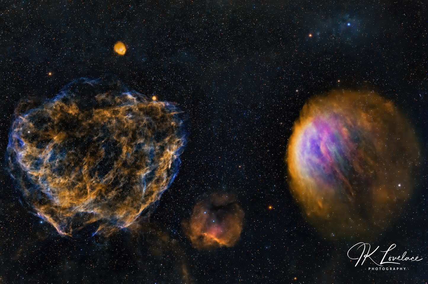 A png of the deep sky photograph titled "Birth, Balance, Death" shot by astrophotographer J K Lovelace featuring a star forming region, planetary nebula, and a supernova remnant in the constellation Auriga.