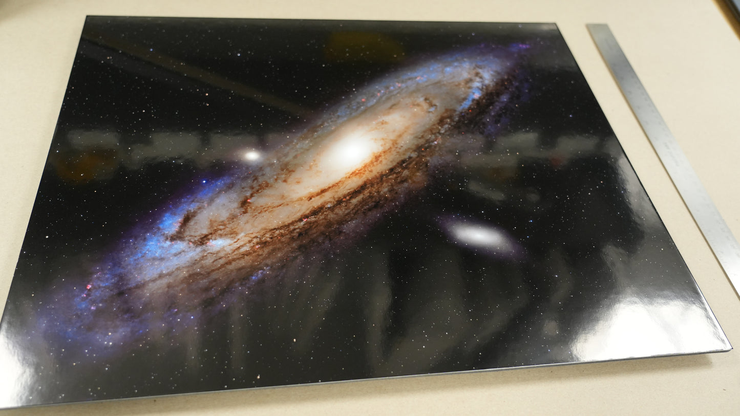 Stylized depiction of a galaxy on a reflective surface