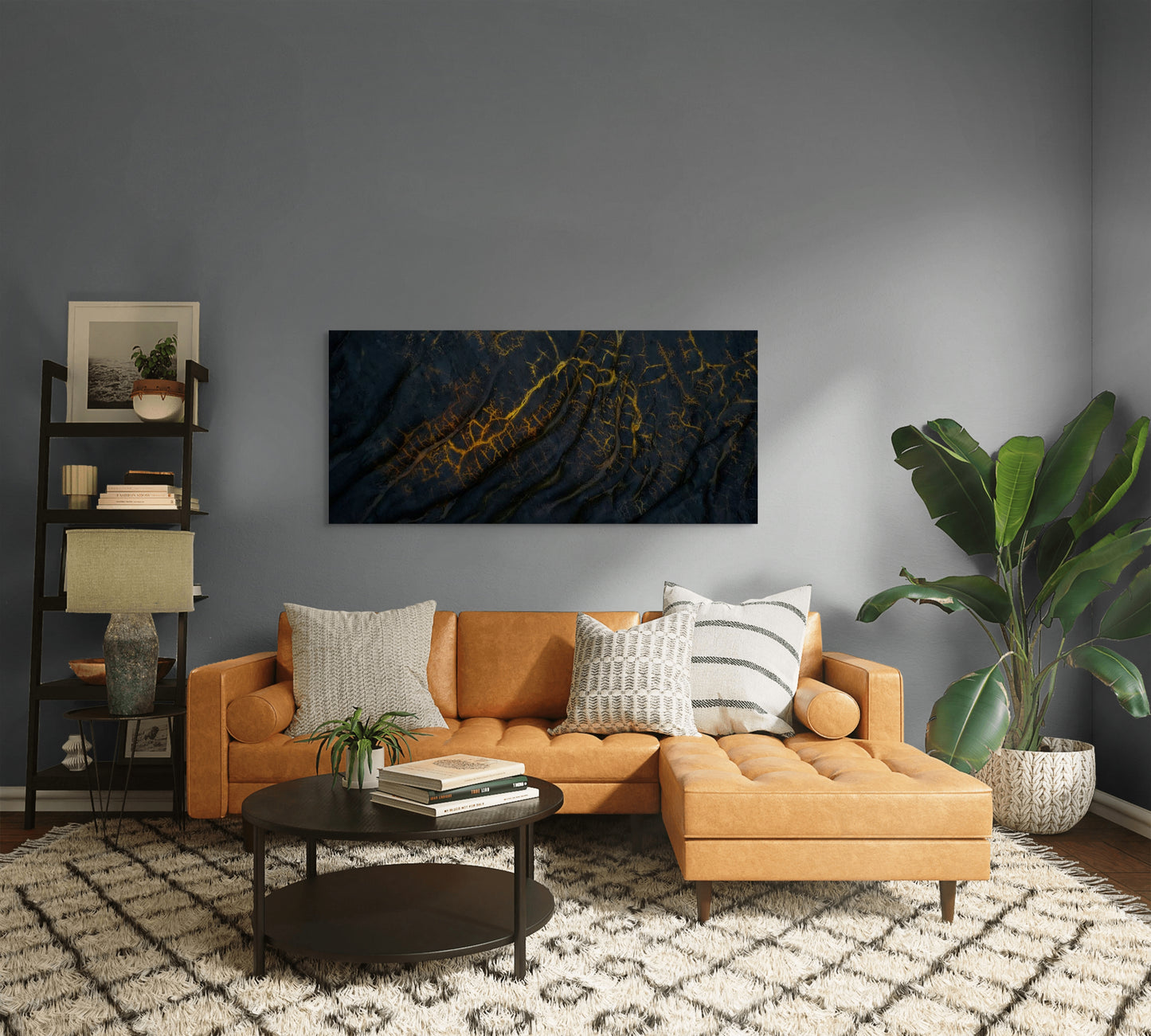 A wall art mockup featuring the photograph titled "Golden Veins" by landscape photographer Ben Coffman as a 60 inch wide metal print with inset frame on display in a modern apartment.