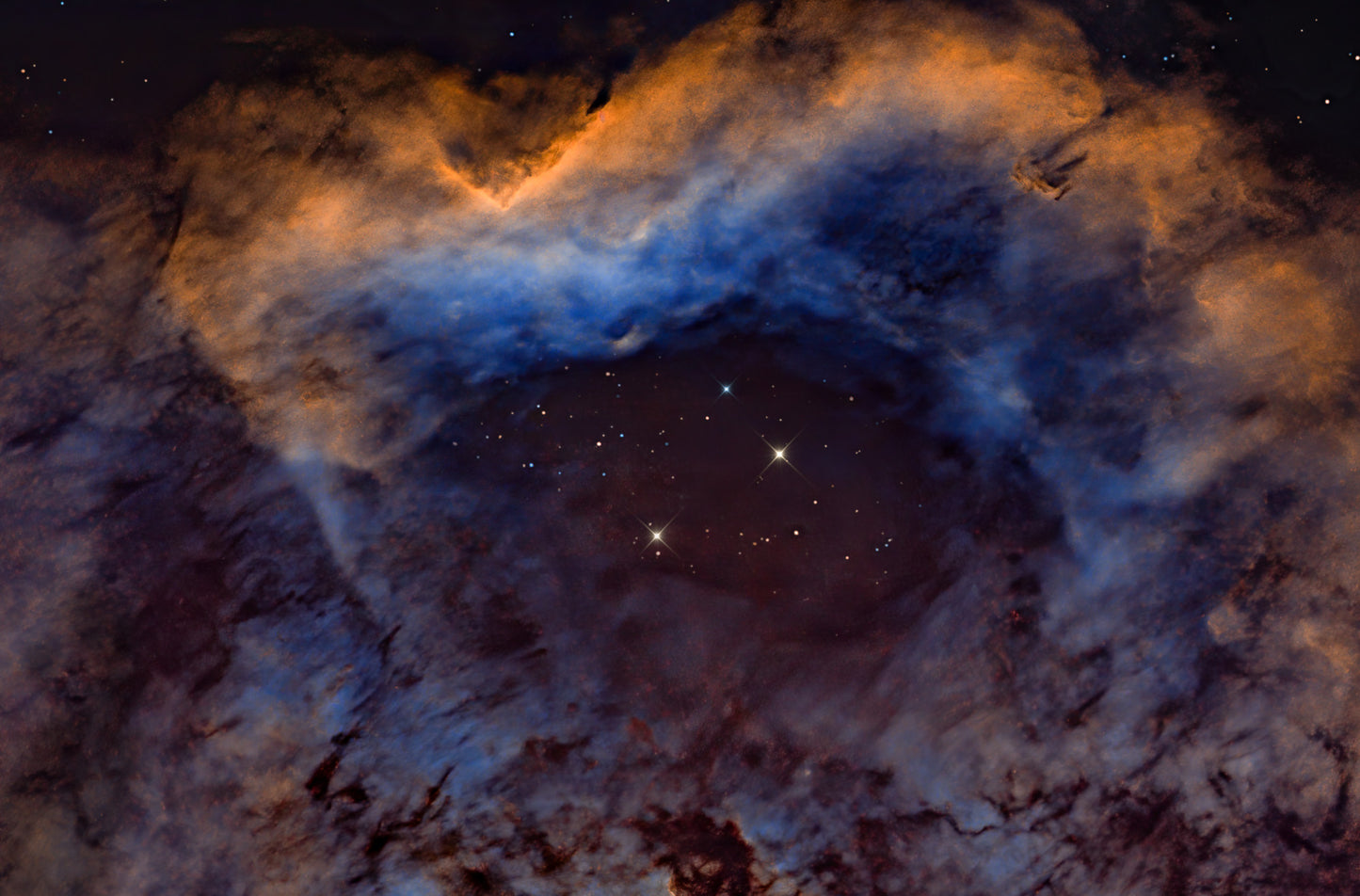 A jpg of the deep sky photograph titled "In a Dragon's Eye" shot by astrophotographer J K Lovelace featuring the nebula LBN 587
