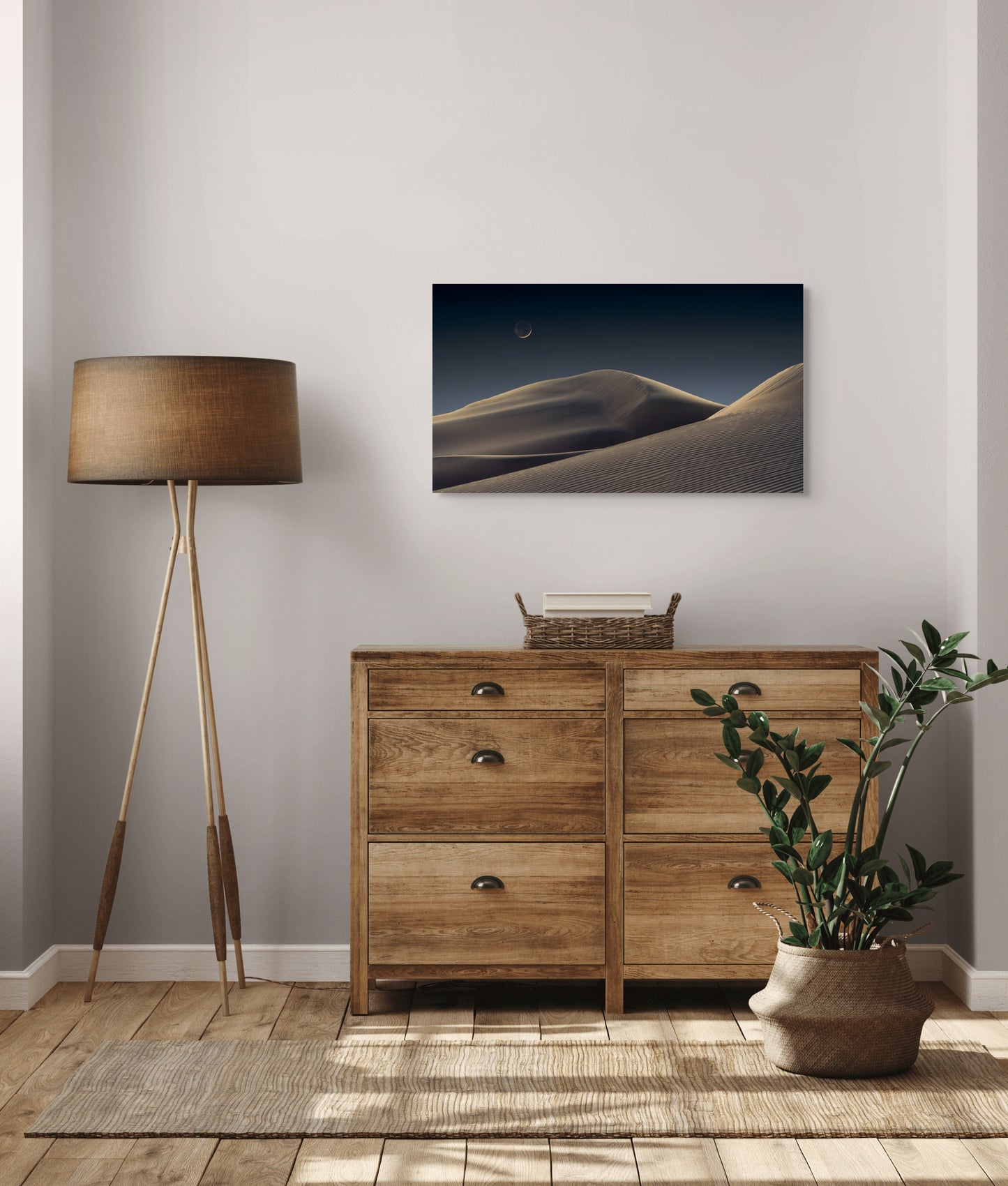 A wall art mockup featuring the photograph titled "Luna Dunes" by landscape photographer J K Lovelace as a 36 inch wide metal print with inset frame on display in a modern bedroom.