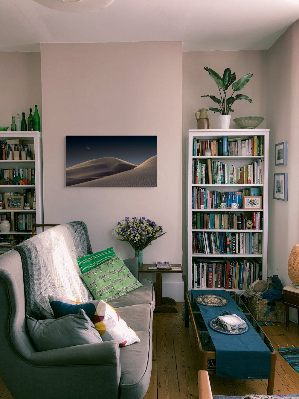 A wall art mockup featuring the photograph titled "Luna Dunes" by landscape photographer J K Lovelace as a 36 inch wide metal print with inset frame on display in modern apartment.