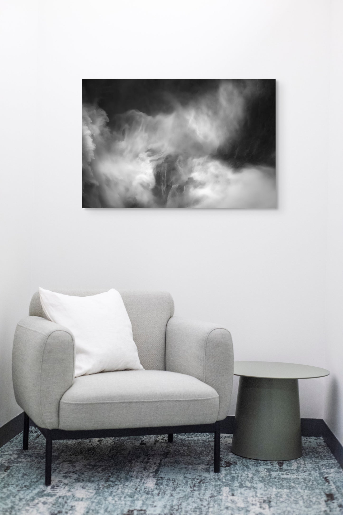 A wall art mockup featuring the photograph titled "Roar Shock I" by landscape photographer Ben Coffman as a 36 inch wide metal print with inset frame on display in a modern waiting room.