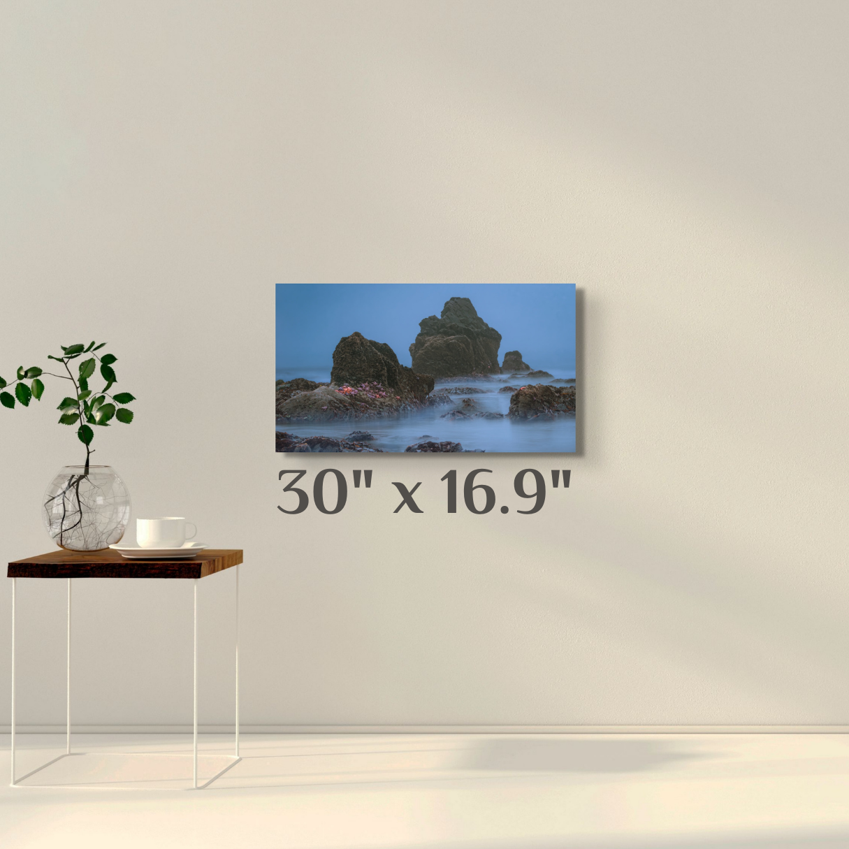 A wall art mockup of the seascape titled, "Seaing Stars" shot by landscape photographer J K Lovelace, on display as a 30 inch wide metal print with inset frame.