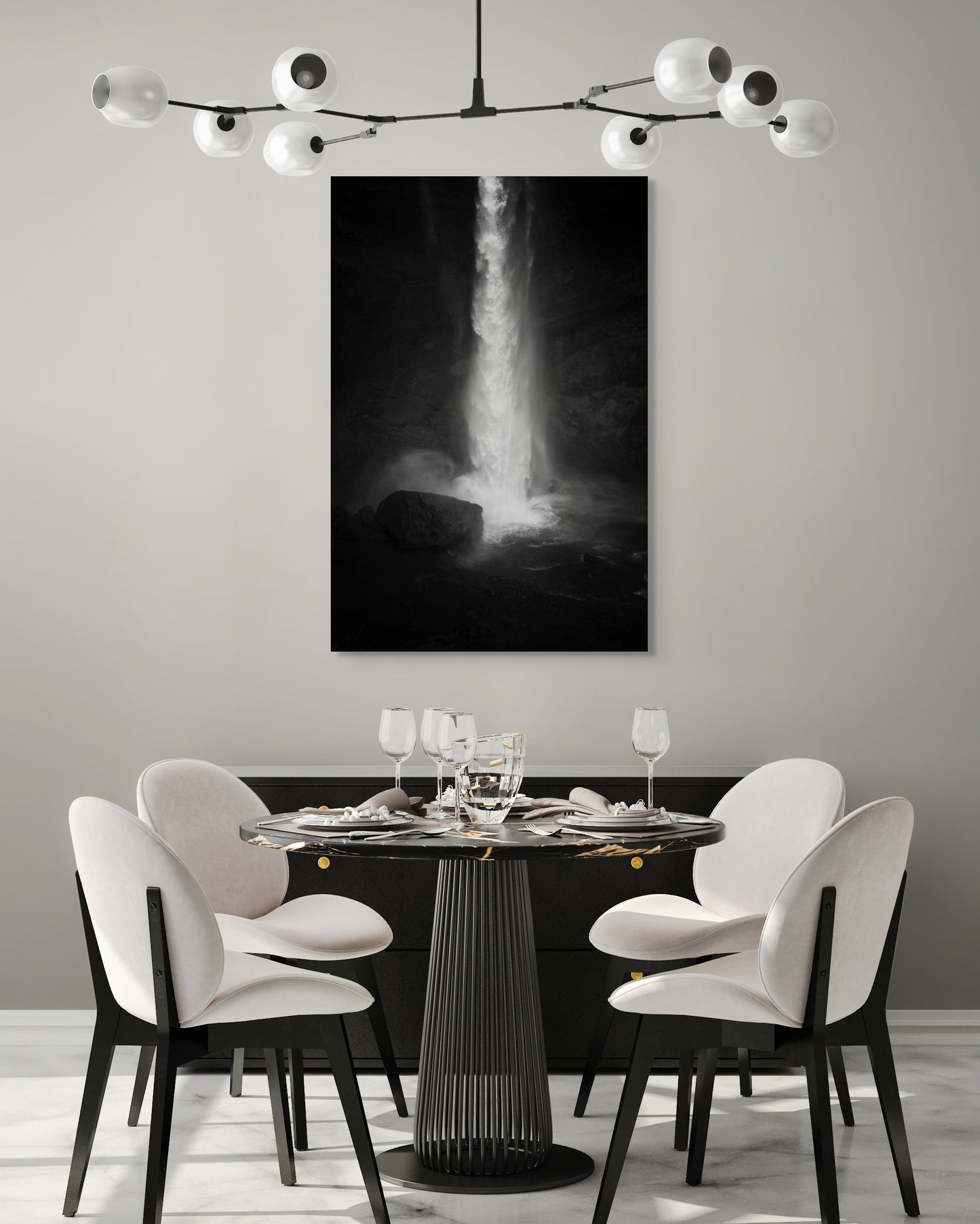 A wall art mockup featuring the photograph titled "Spring Waterfall, Iceland" by landscape photographer Ben Coffman as a 30 inch wide metal print with inset frame on display in a modern dining room.