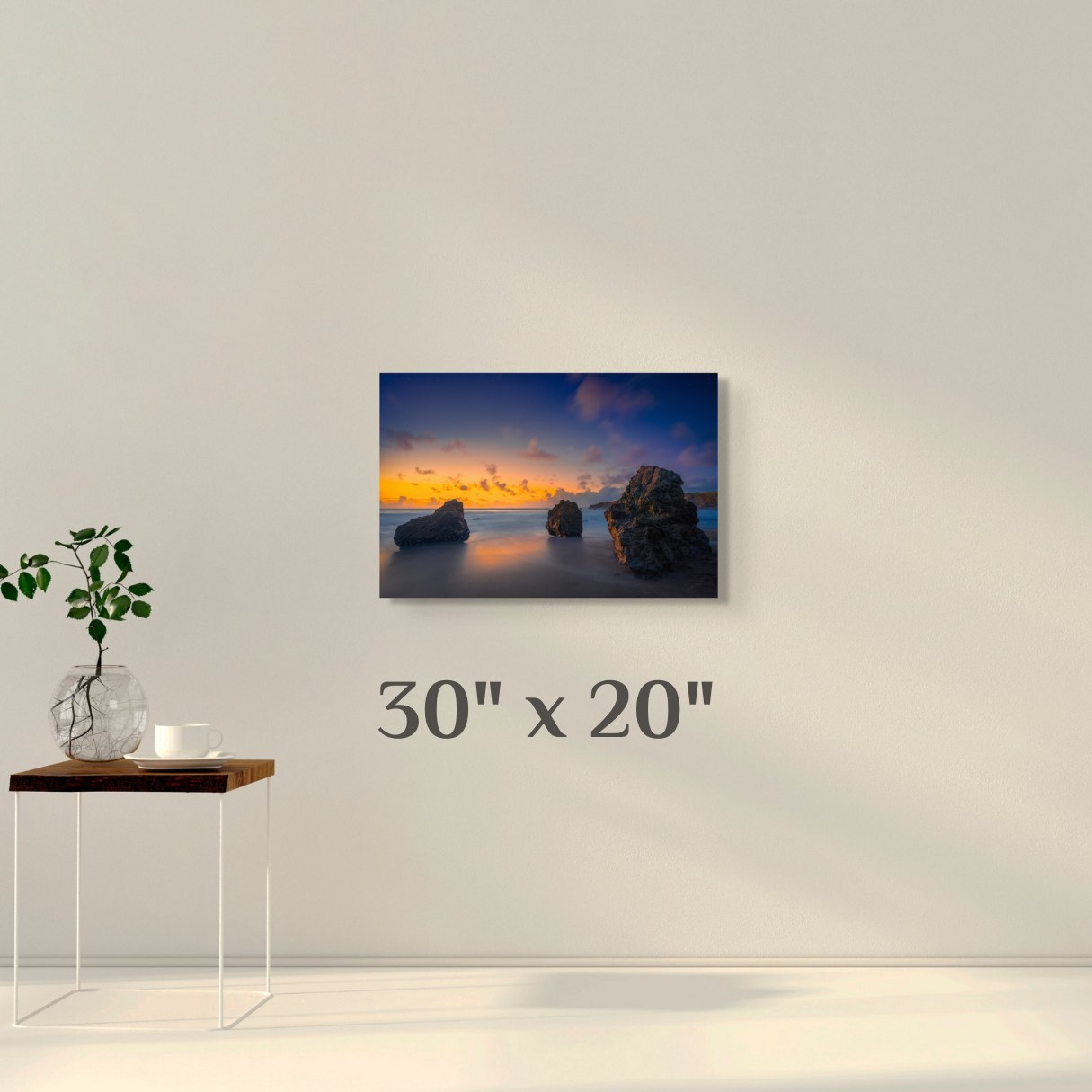 A simple wall art mockup featuring the 30 inch wide metal print titled "Three Pebbles" on display on a wall.