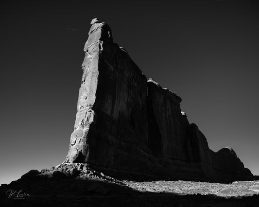 A jpg of the black and white photograph titled "Tower of Babel" shot by landscape photographer J K Lovelace, featuring a large rock formation.