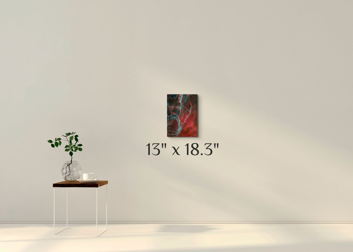 A simple wall art mockup featuring the 13 inch wide metal print titled "Aqua Vela" displayed on a wall.