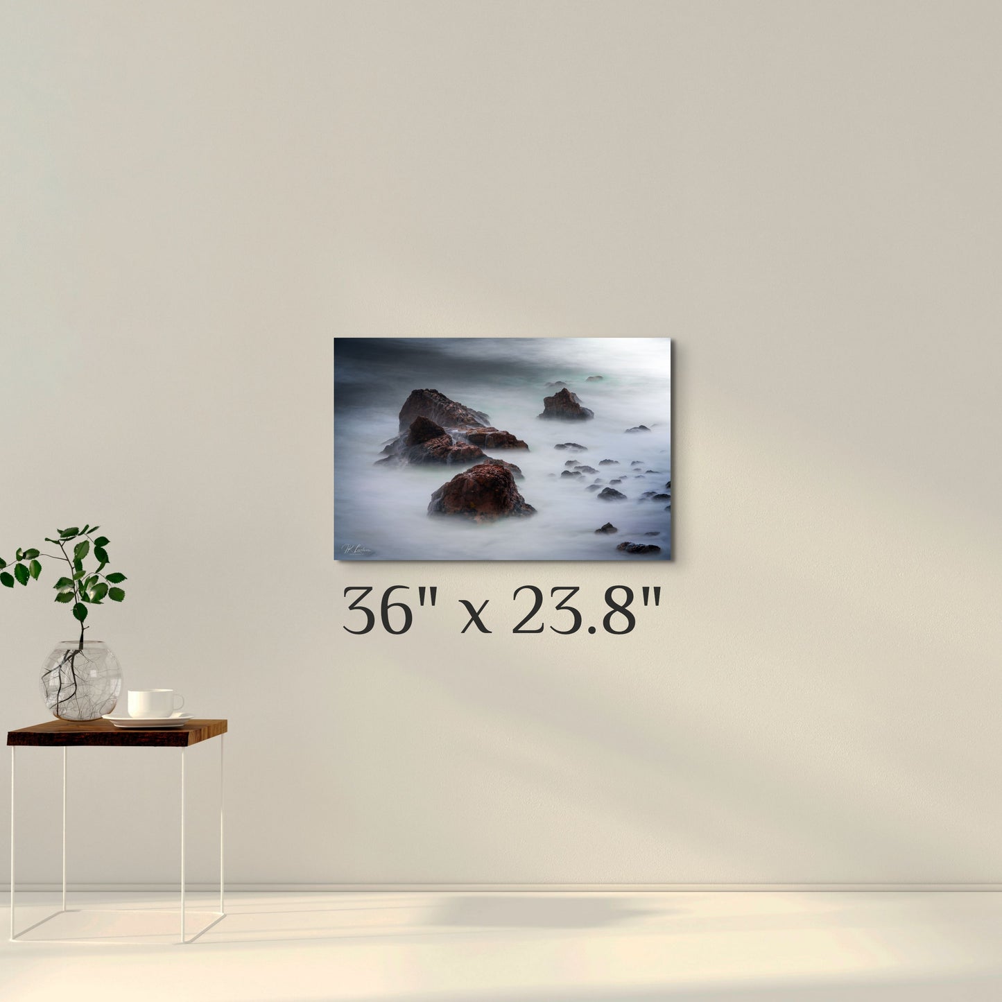 A simple wall art mockup featuring the 36 inch wide metal print titled "Beyond Here Be Dragons" on display on a wall.