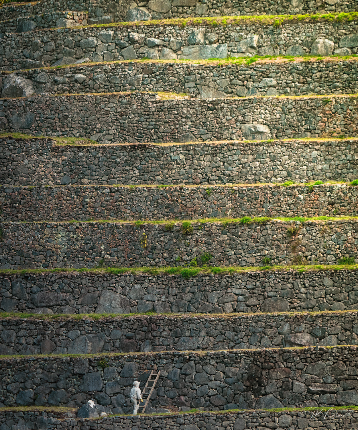 A jpg of the daylight landscape photograph titled "Happy New Year" shot by landscape photographer J K Lovelace featuring Machu Picchu architecture
