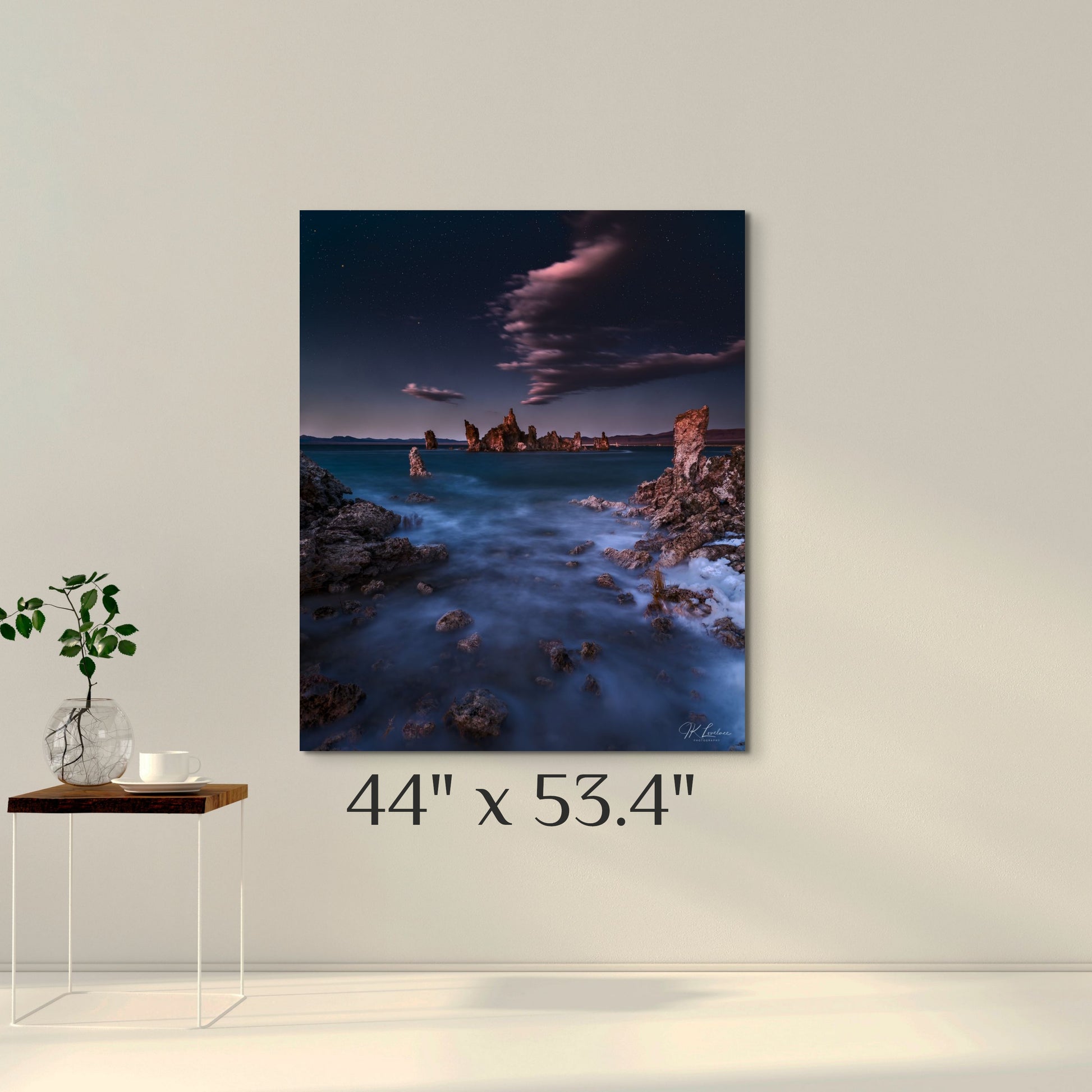 A wall art mockup featuring the 44 inch metal print titled "Mono Lith" in inset frame on wall