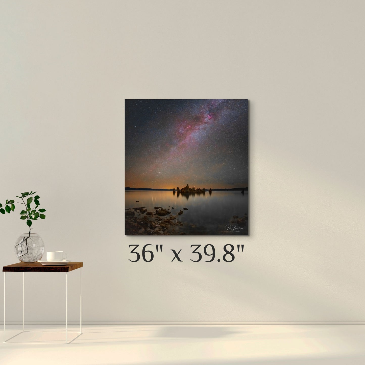 A simple wall art mockup featuring the 36 inch wide metal print titled "Mono Midnight" displayed on a wall.