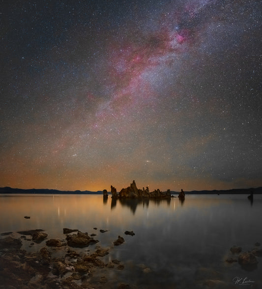 A jpg of the nightscape photograph titled "Mono Midnight" shot by landscape photographer J K Lovelace featuring the red Hydrogen II regions of the Milky Way shining over Mono Lake