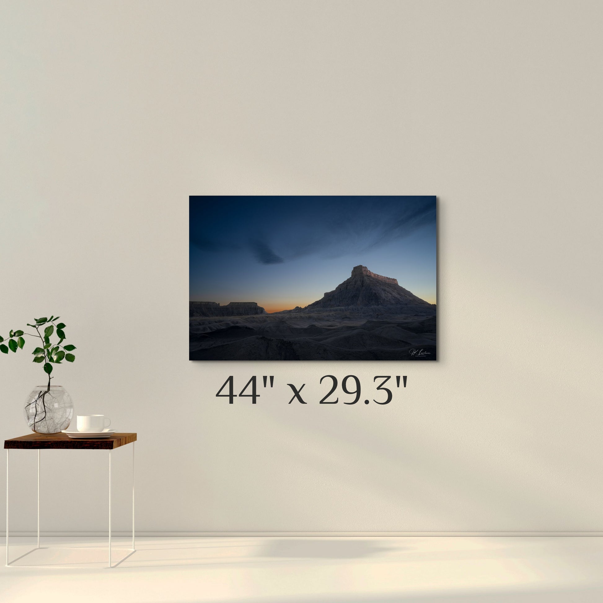 A simple wall art mockup featuring the 44 inch wide metal print titled "Night Shift" displayed on a wall.