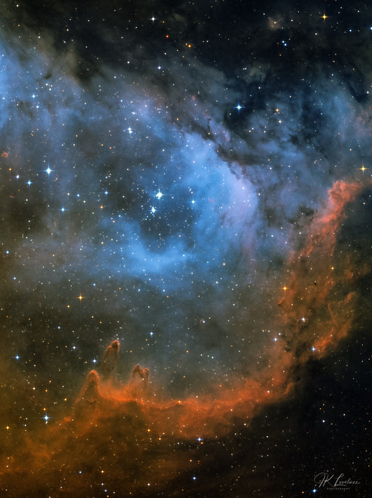 A jpg of the deep sky photograph titled "Seat of the Soul" shot by astrophotographer J K Lovelace featuring vast clouds of Hydrogen, Sulphur, Oxygen, and dust swirling around bright young stars in the lower back region of The Soul Nebula