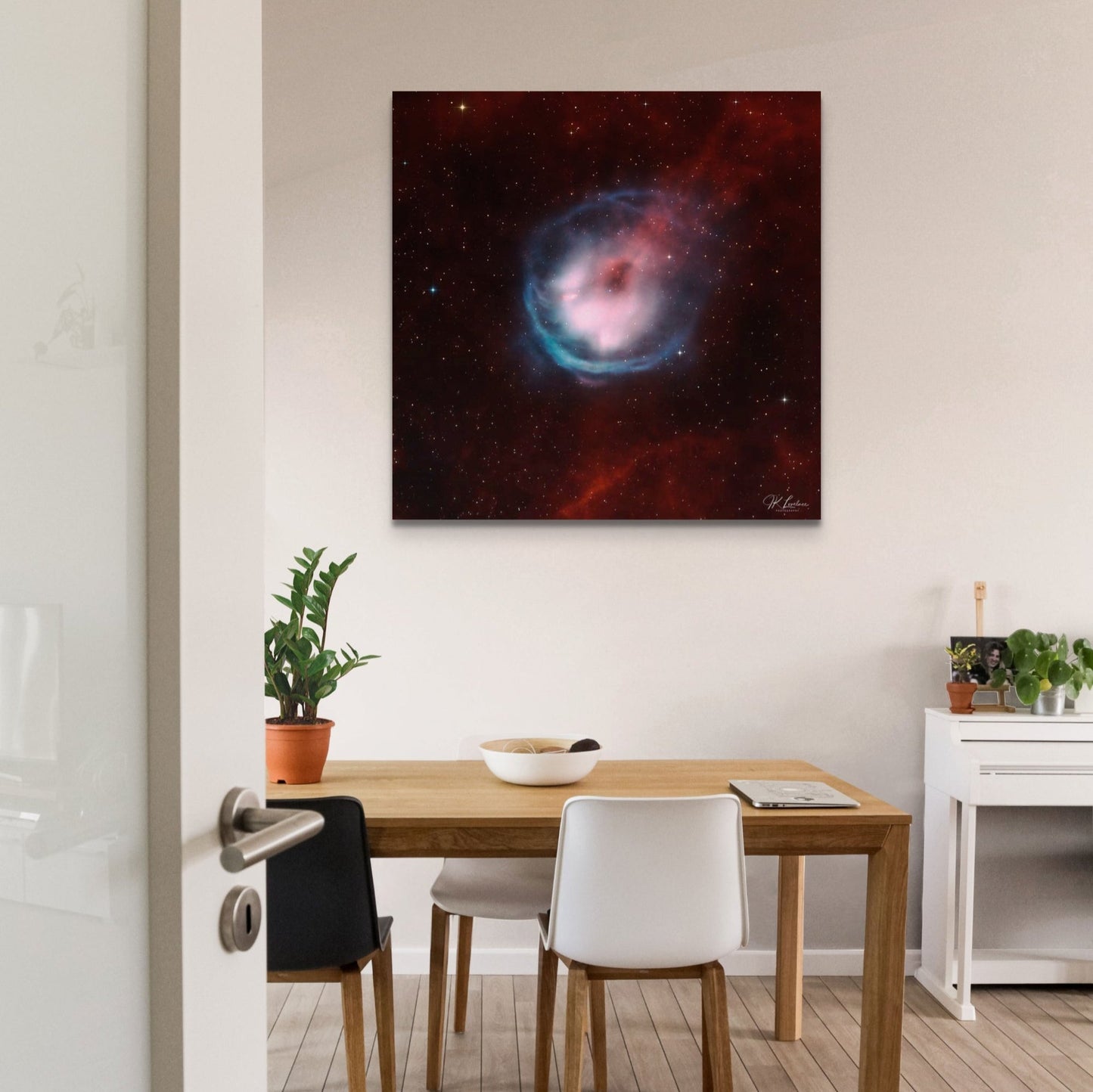 A wall art mockup of the metal print titled "Star Falling" on display in a modern apartment