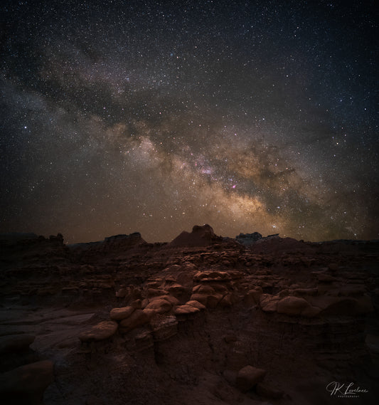 A jpg of the nightscape photograph titled "The High Road" shot by landscape photographer J K Lovelace featuring rock formations in Wayne County, Utah and the Milky Way Core.