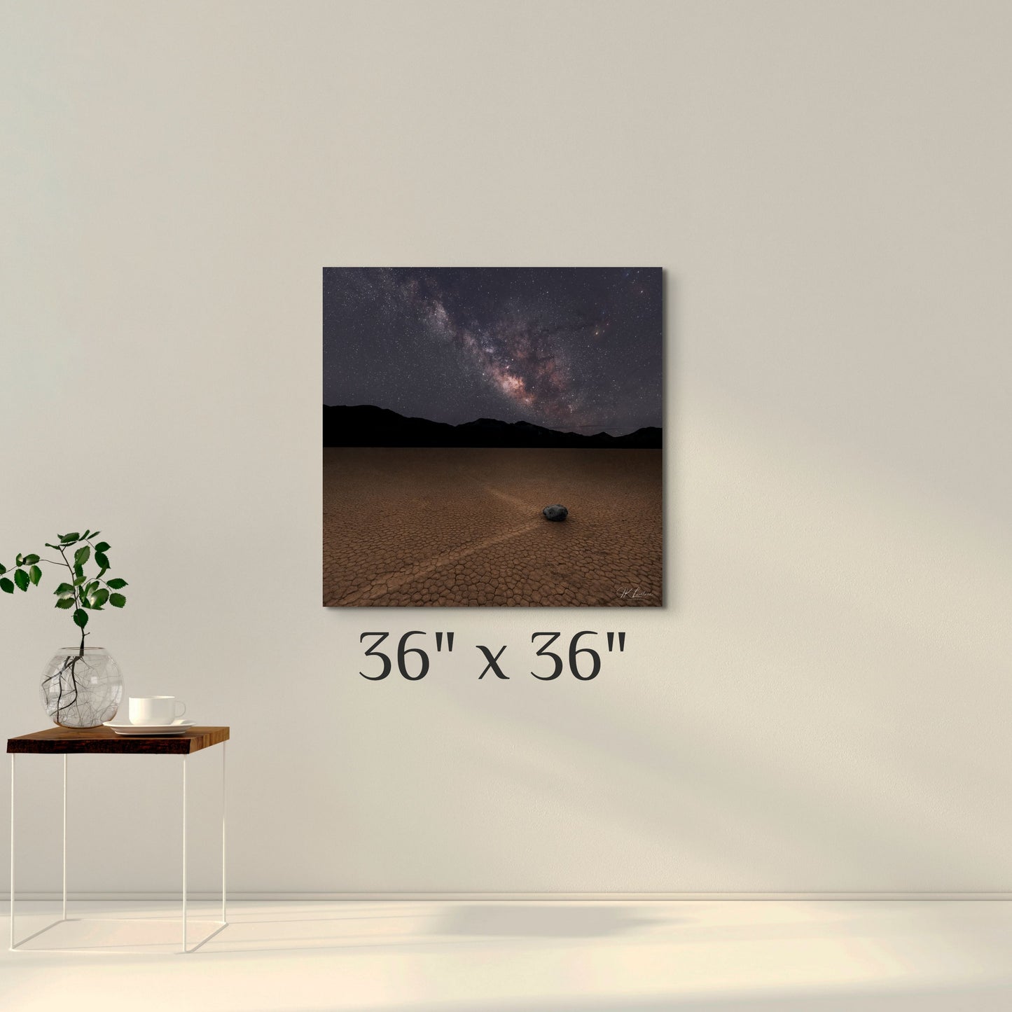 A simple wall art mockup featuring the 36 inch wide metal print titled "The Sailing Stone" displayed on a wall.