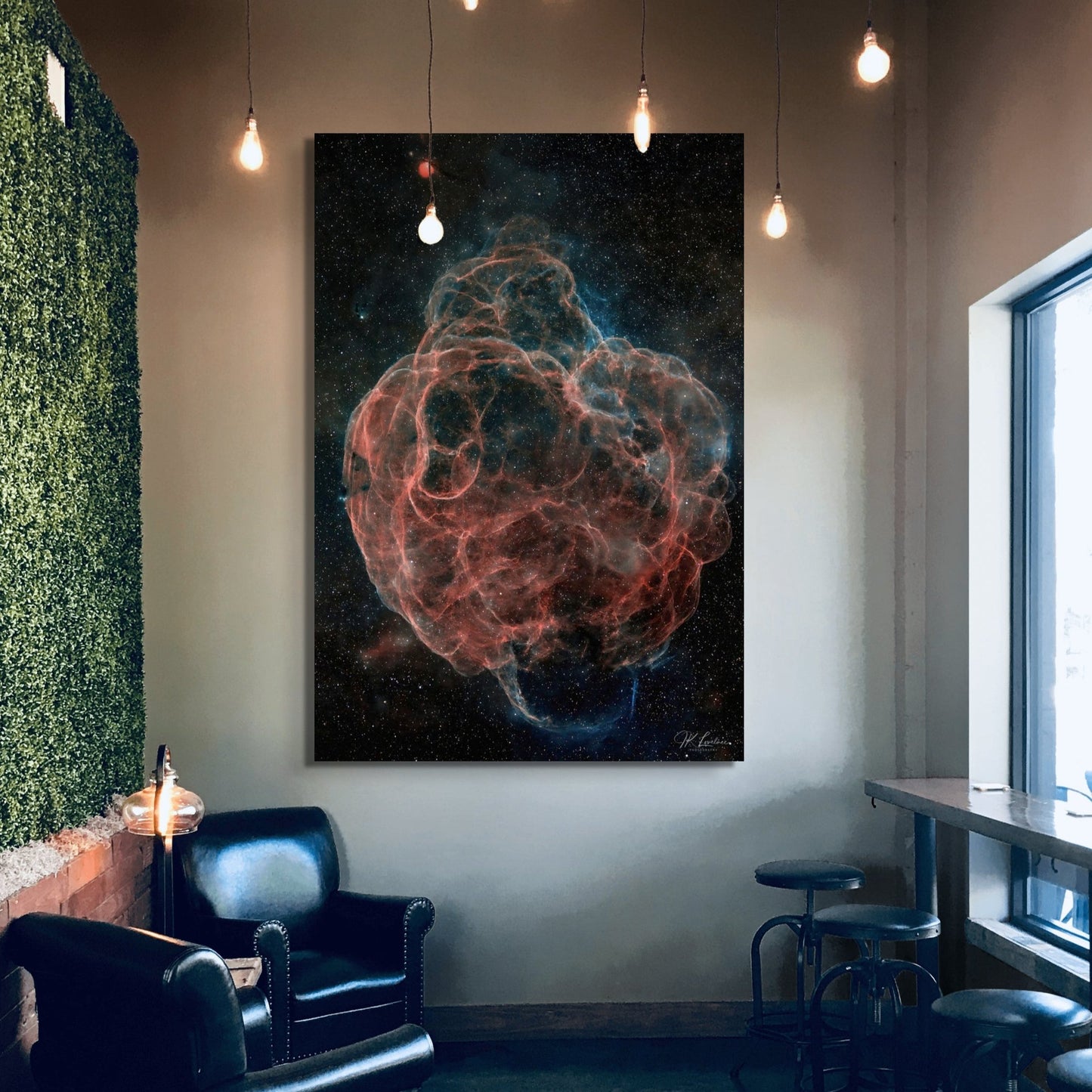 A wall art mockup of the metal print titled "Web of Wisps" on display in a modern industrial style cafe