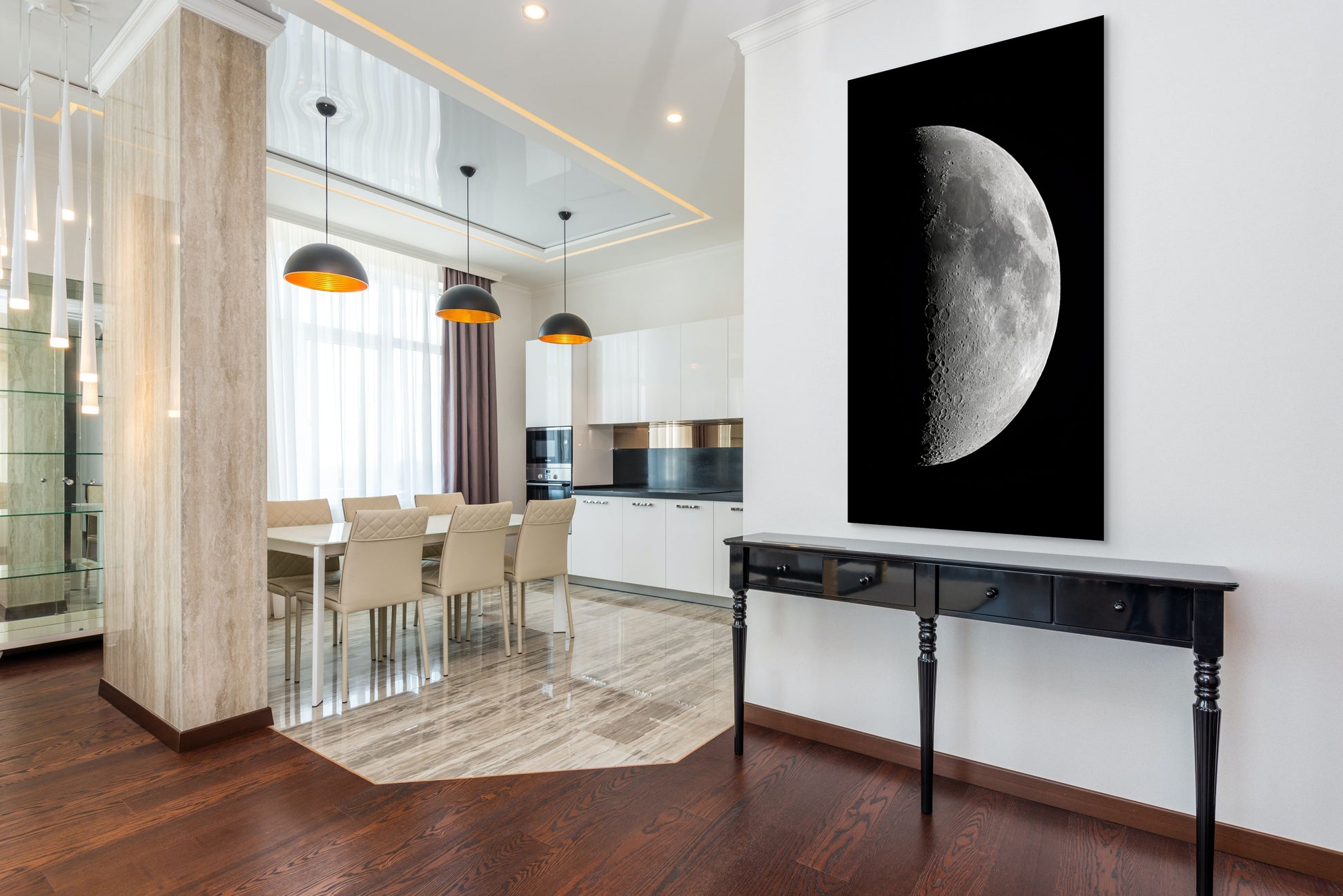 A wall art mockup featuring the photograph titled "1st Quarter Moon" by astrophotographer J K Lovelace as a 30 inch wide metal print with inset frame on display in a modern home.