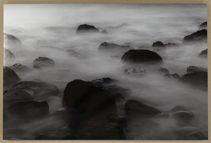 Framed black and white photograph of a rocky landscape