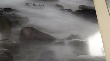 Rocks with steam rising from hot springs