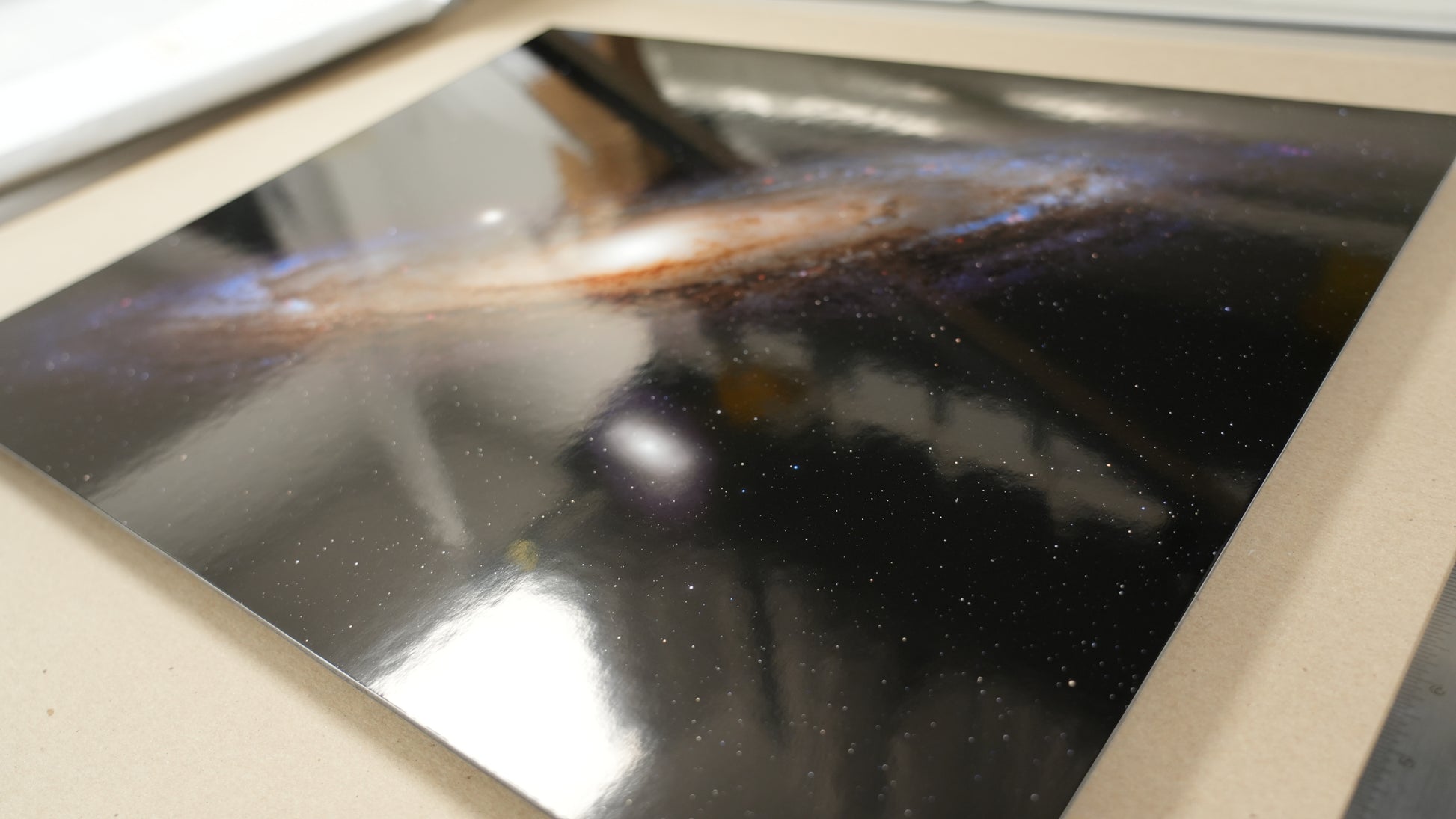 Close-up of a reflective surface with a blurred background