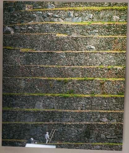 Close-up of a textured surface with a ruler for scale