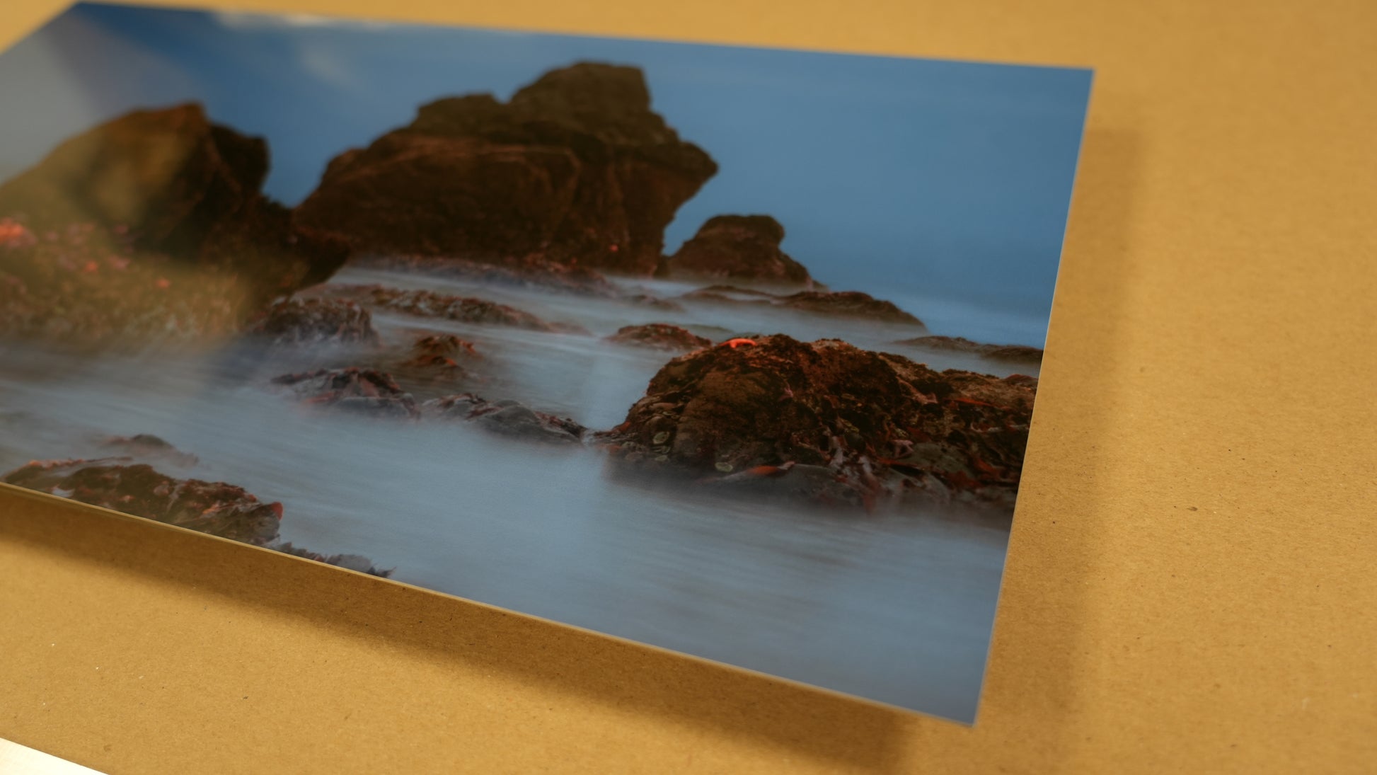 Close-up of a rock formation with water on a brown surface