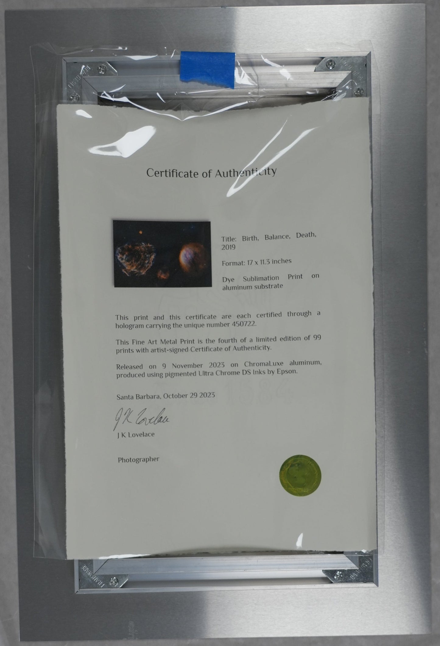 Certificate of authenticity in a clear protective sleeve on a brown background