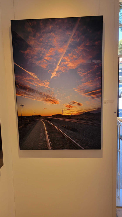 A photograph of the metal print titled, "Go West" shot by landscape photographer J K Lovelace, on display in Slice of Light Gallery