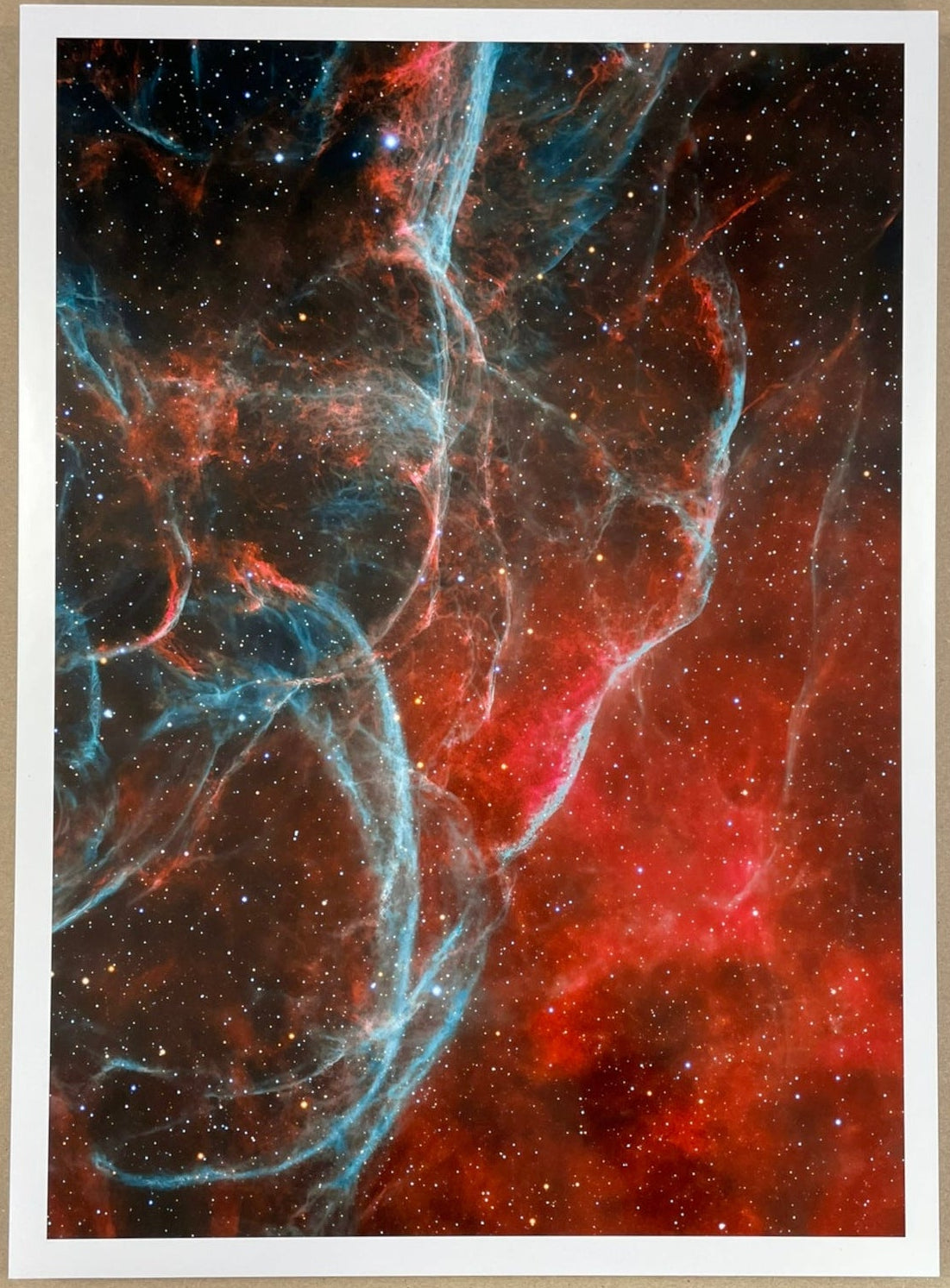 Colorful nebula print on a beige background