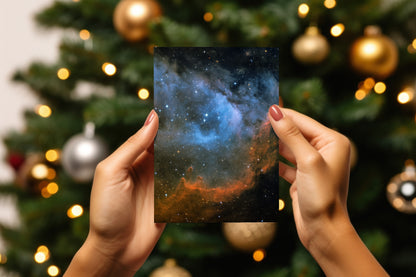 A digital mockup of a greeting card featuring the photograph titled "Seat of the Soul" being held in someone's hands with christmas tree detail out of focus in the background.