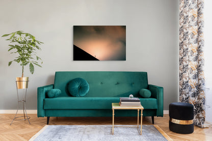 A wall art mockup featuring the photograph titled "Shadow Archetype" by landscape photographer Ben Coffman as a 44 inch wide metal print with inset frame on display in a modern apartment.