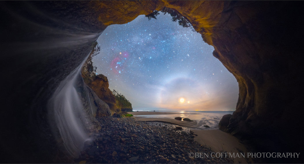 A jpg of the photograph titled "Starfalls II" by landscape photographer Ben Coffman, featuring a waterfall breaking on the beach with the night sky overhead in a nontraditionally projected panorama, Oregon coast.