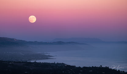 A jpg of the photograph titled "Supermoon Over Summerland" shot by landscape photographer J K Lovelace, featuring the coastline of Summerland, California