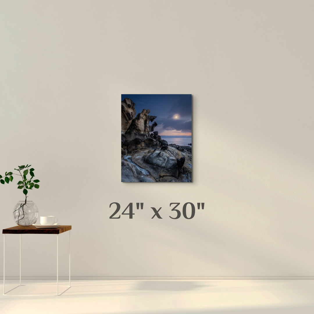 A wall art mockup featuring the seascape photograph titled "The Ancient Mariner" as a 24 inch wide metal print in inset frame displayed on a wall.