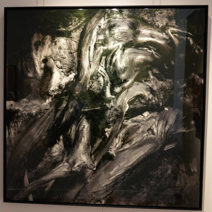 Large abstract painting on a wall in an art gallery setting