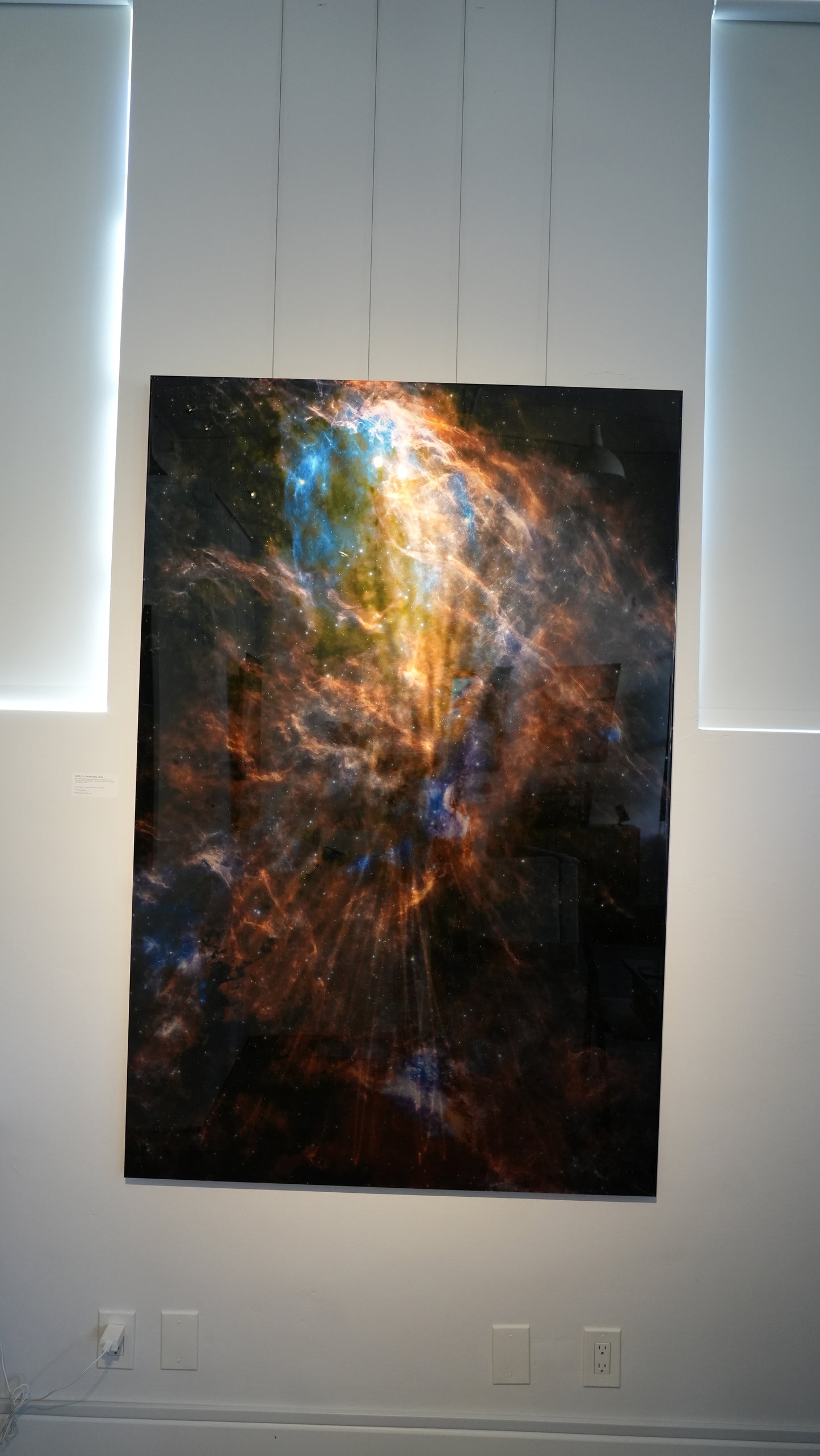Large space nebula painting on a white wall