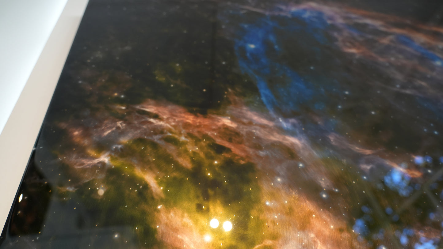 Close-up of a space-themed painting with vibrant colors