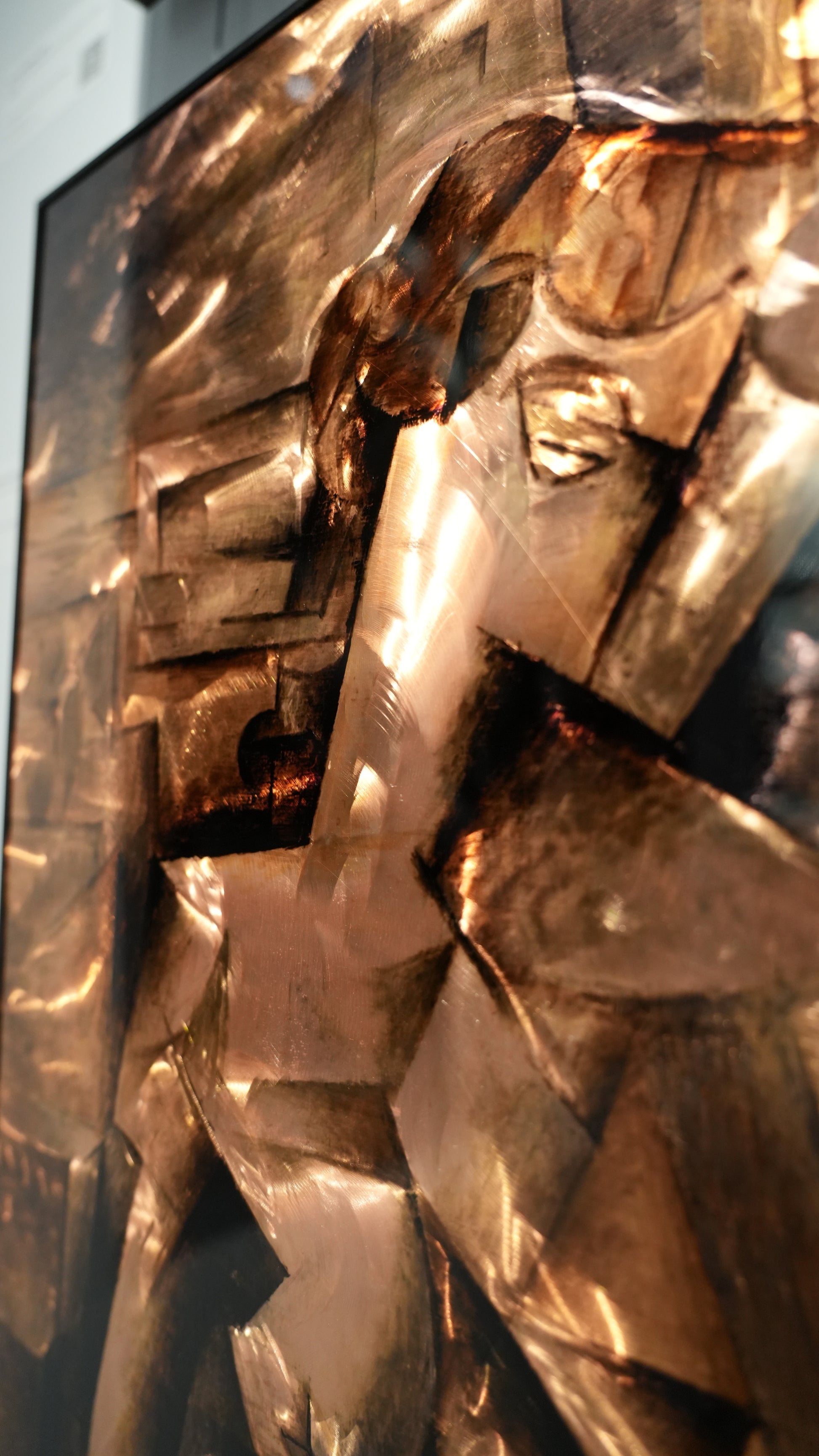 Close-up of a metallic sculpture with intricate details