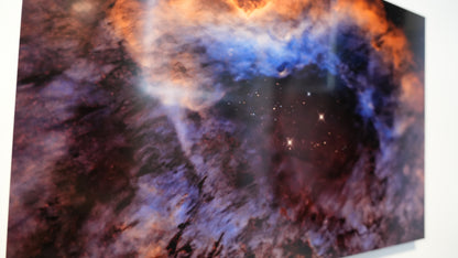 Star-forming region in space with colorful nebulae on a white background