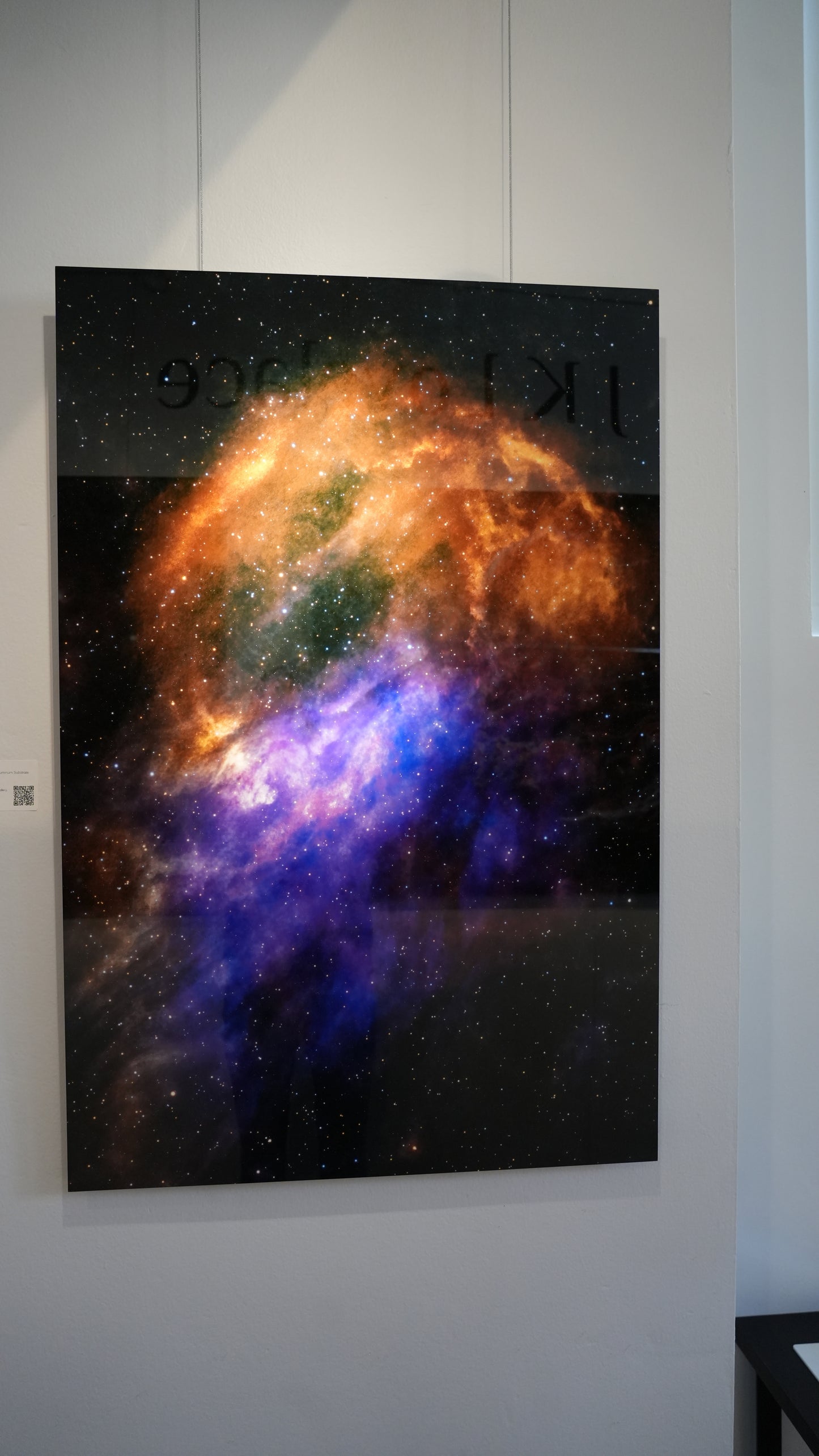 Colorful nebula painting on a white wall