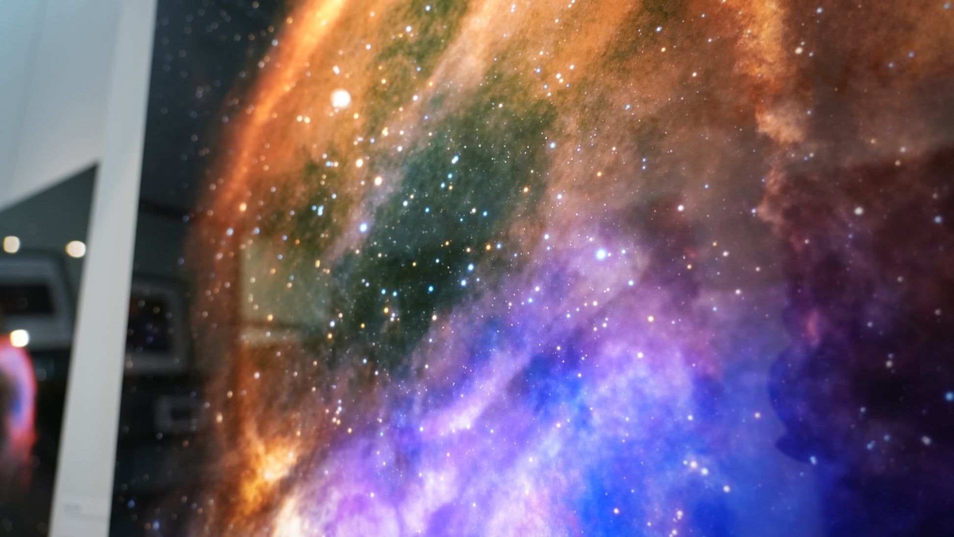 Close-up of a space-themed display with vibrant colors