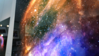 Close-up of a space-themed display with vibrant colors