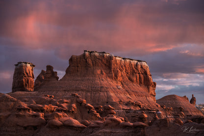 A jpg of the landscape photograph titled "After the Storm" shot by landscape photographer J K Lovelace featuring a Utah sunset and rock formations after a rain storm