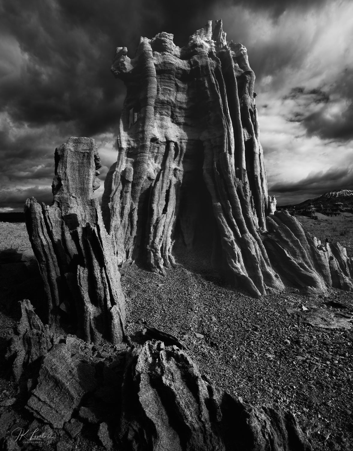 A jpg of the black and white landscape photograph titled "Ancient Tower" shot by landscape photographer J K Lovelace featuring sand tufa formations