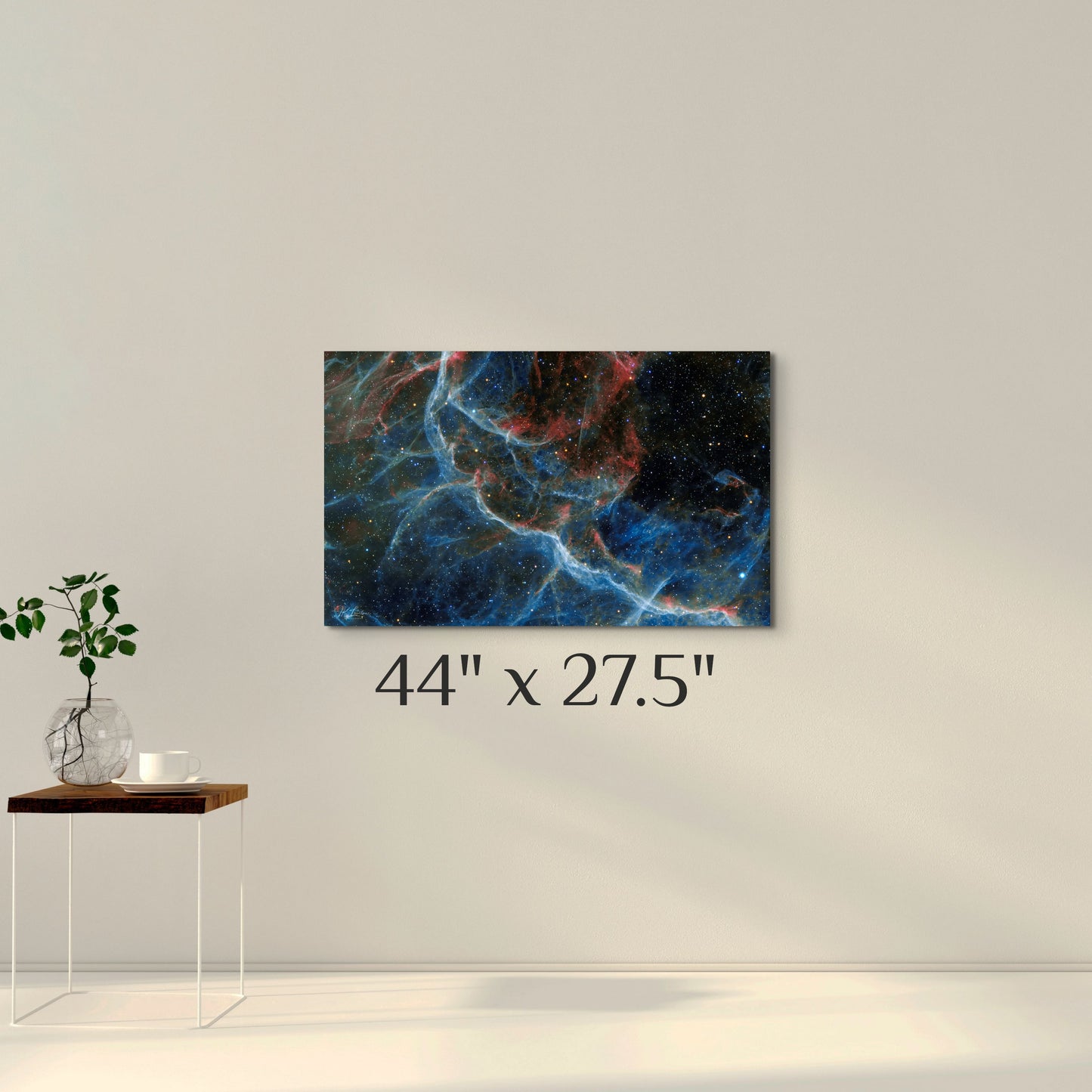 A simple wall art mockup featuring the 44 inch wide metal print in inset frame titled "Blue Vela" displayed on a wall.