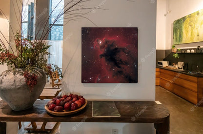 A wall art mockup of the metal print in inset frame titled "Elmo's Ghost" on wall in rustic farmhouse home.