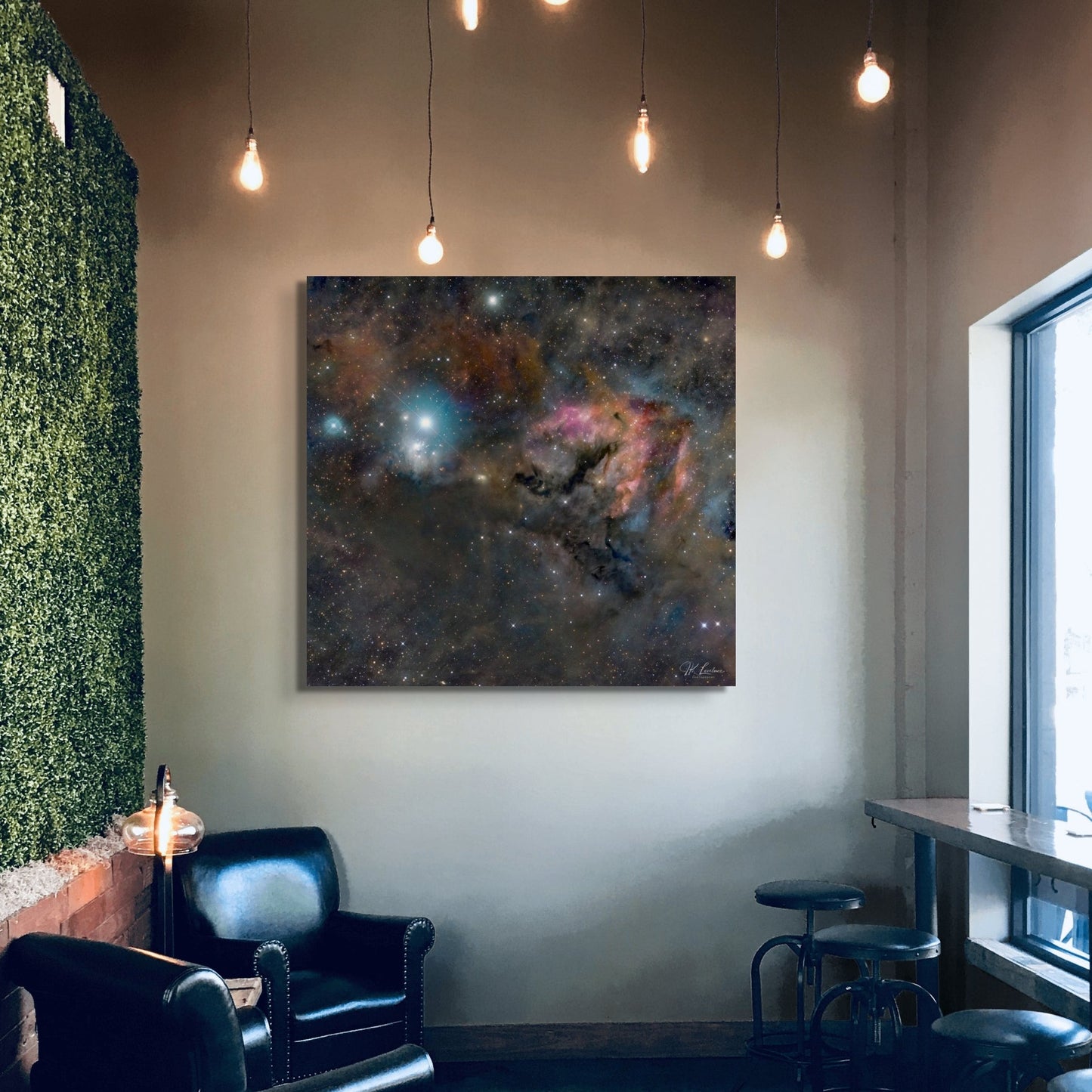 A wall art mockup featuring the metal print titled "The Snail of Perseus" on display in a modern cafe